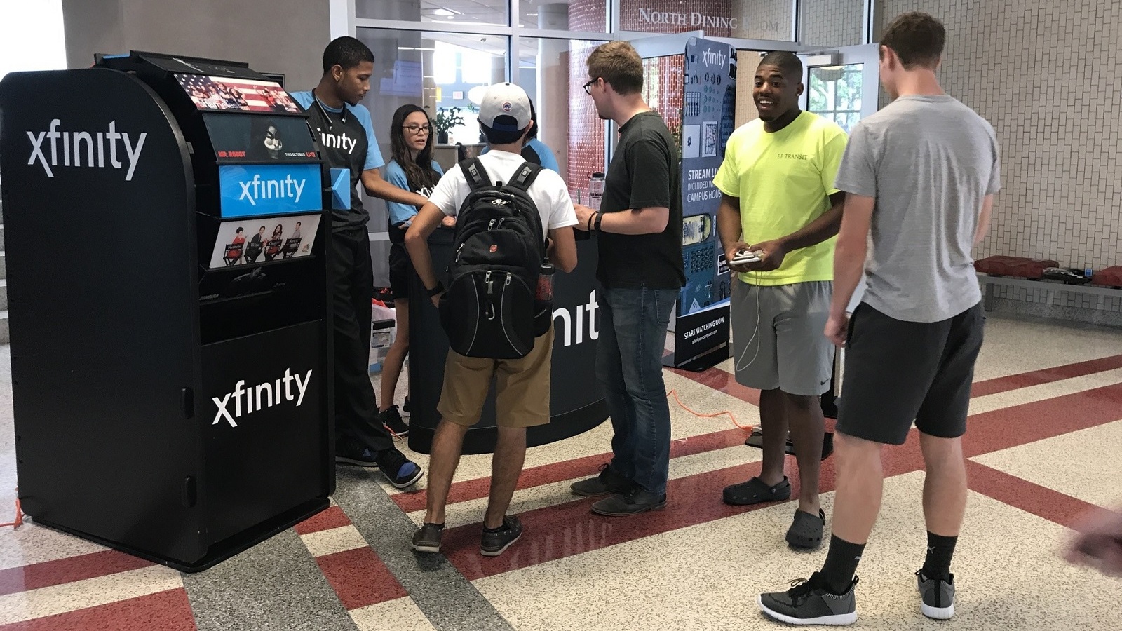 A group of students participate in an Xfinity On Campus event.