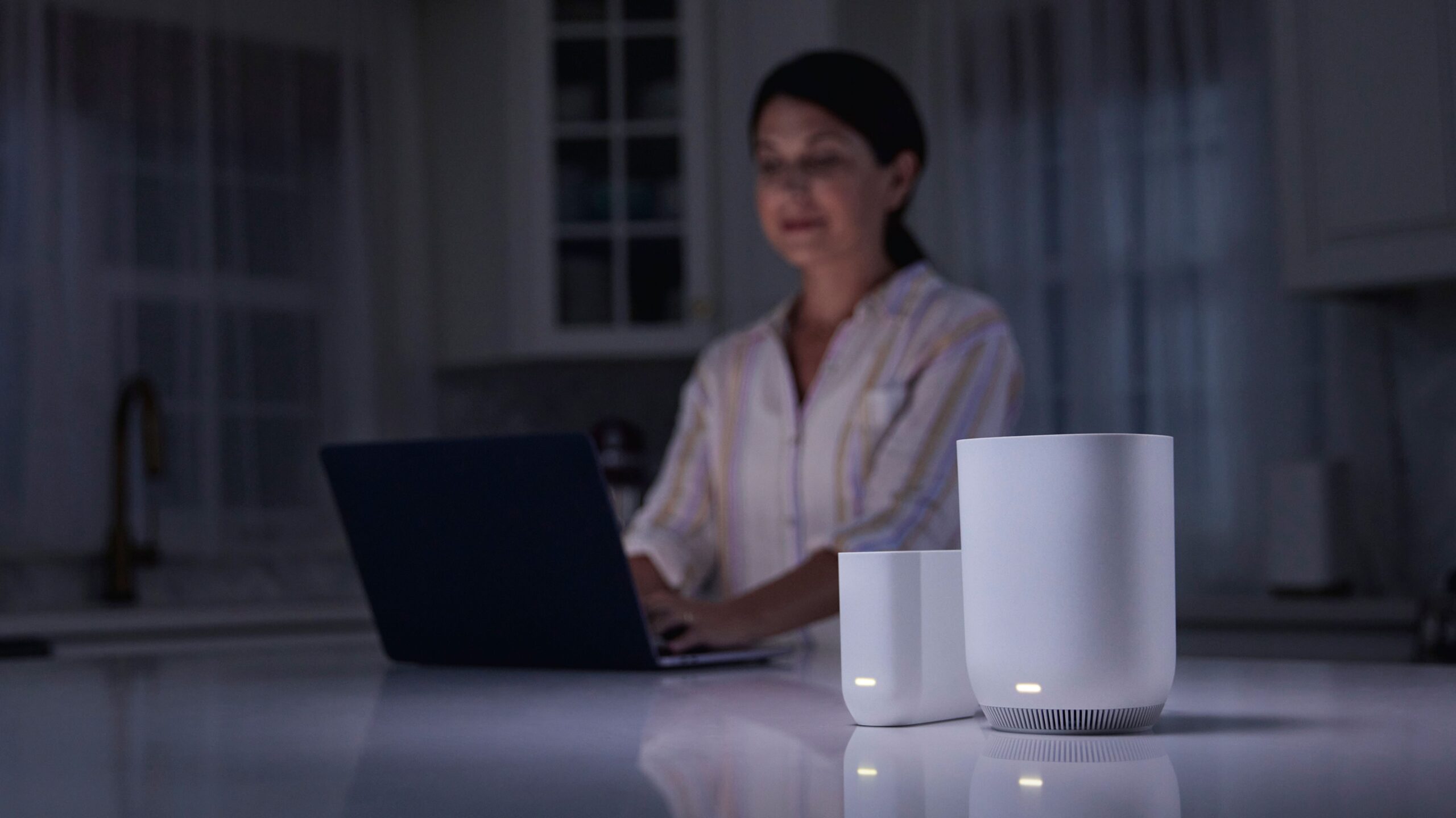 Female staying connected during a storm with Storm-Ready WiFi.