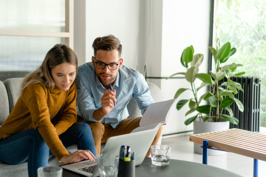 Couple planning on laptop